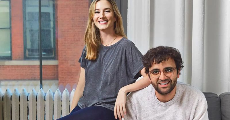 Kalshi co-founders Luana Lopes Lara and Tarek Mansour sitting together in a casual office setting